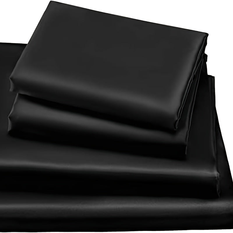 This 4pcs Satin Bed Sheet Set Includes One Fitted Sheet, One Flat Sheet, And Two Pillowcases Without Inserts. The Solid Color Showcases a Simple And Elegant Design That Never Goes Out of Style. Made from Polyester, The Fabric - Bako Bako