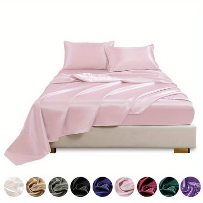 This 4pcs Satin Bed Sheet Set Includes One Fitted Sheet, One Flat Sheet, And Two Pillowcases Without Inserts. The Solid Color Showcases a Simple And Elegant Design That Never Goes Out of Style. Made from Polyester, The Fabric - Bako Bako