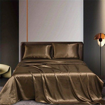 This 4pcs Satin Bed Sheet Set Includes One Fitted Sheet, One Flat Sheet, And Two Pillowcases Without Inserts. The Solid Color Showcases a Simple And Elegant Design That Never Goes Out of Style. Made from Polyester, The Fabric - Bako Bako