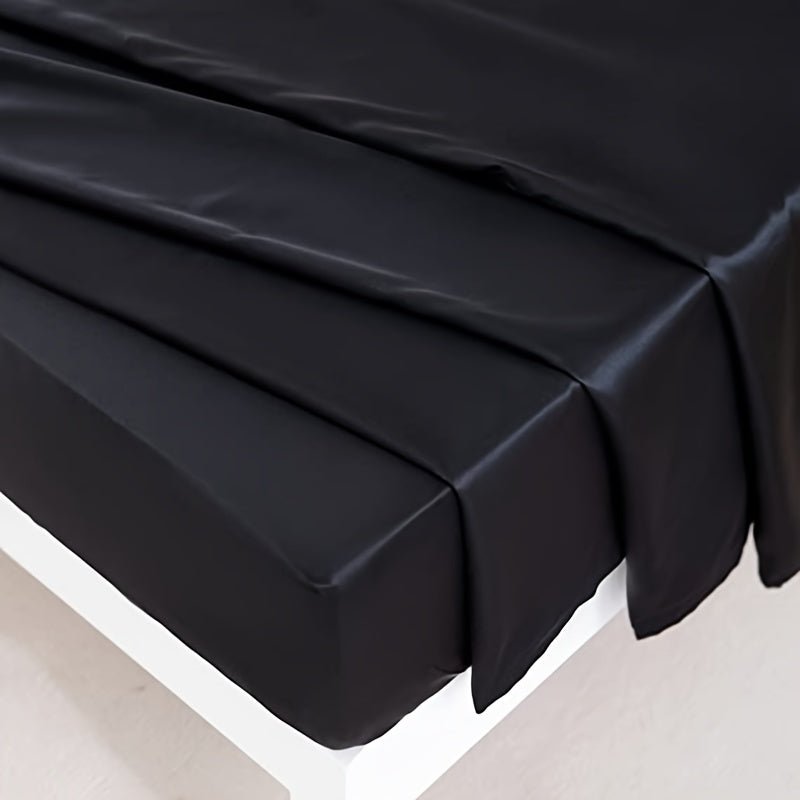This 4pcs Satin Bed Sheet Set Includes One Fitted Sheet, One Flat Sheet, And Two Pillowcases Without Inserts. The Solid Color Showcases a Simple And Elegant Design That Never Goes Out of Style. Made from Polyester, The Fabric - Bako Bako